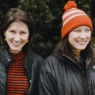 Kim and Kelley deal casually posing outside in winter garb.